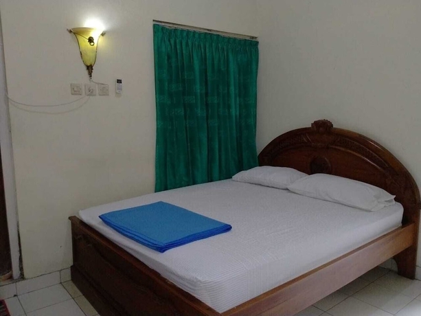 Imagen de la habitación del Hotel Prayogolama Guest House. Foto 14