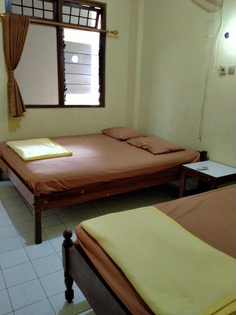 Imagen de la habitación del Hotel Prayogolama Guest House. Foto 15