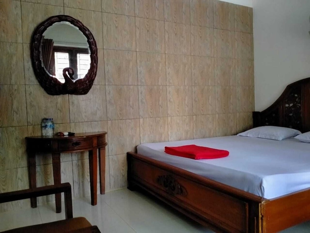 Imagen de la habitación del Hotel Prayogolama Guest House. Foto 17