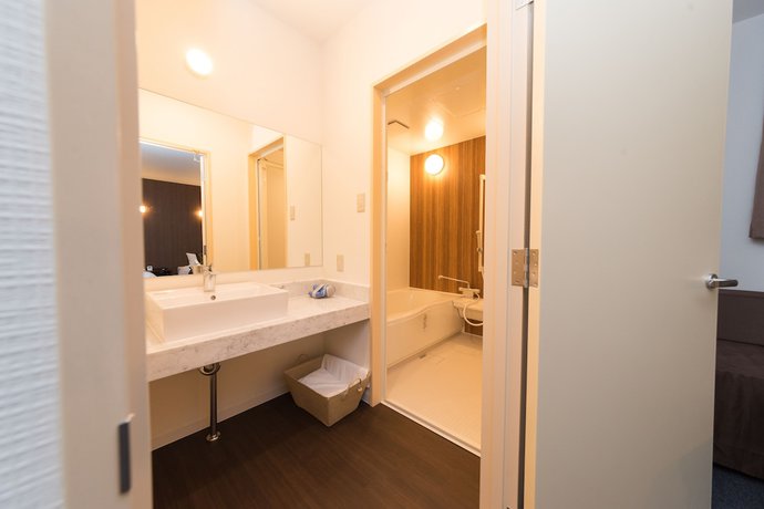 Imagen de la habitación del Hotel Precia Naha Tsujimachi. Foto 4