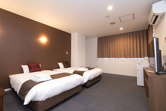 Imagen de la habitación del Hotel Precia Naha Tsujimachi. Foto 6