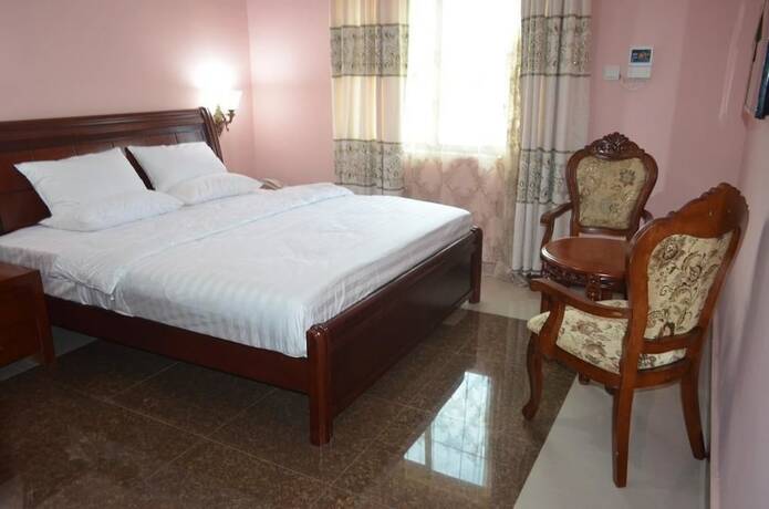 Imagen de la habitación del Hotel Precious Guest lodge. Foto 19