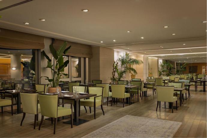 Imagen del bar/restaurante del Hotel Precise House Mantegna Roma. Foto 2