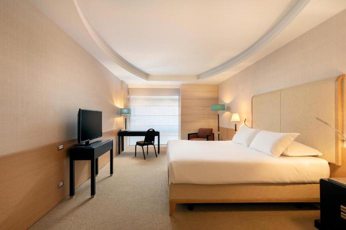 Imagen de la habitación del Hotel Precise House Mantegna Roma. Foto 9