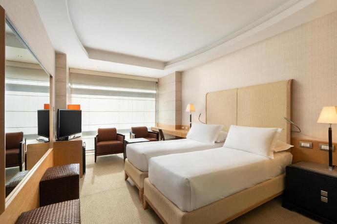 Imagen de la habitación del Hotel Precise House Mantegna Roma. Foto 13