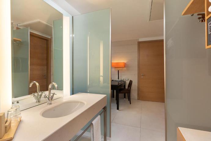 Imagen de la habitación del Hotel Precise House Mantegna Roma. Foto 15