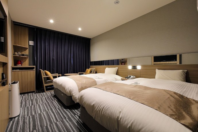 Imagen de la habitación del Hotel Prefort Nishiakashi. Foto 6