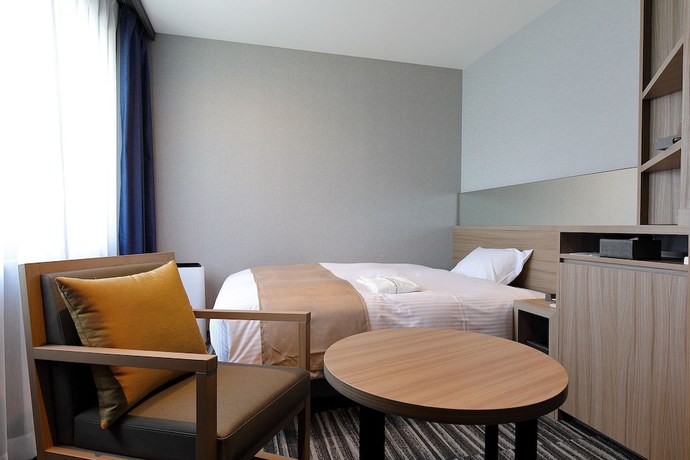 Imagen de la habitación del Hotel Prefort Nishiakashi. Foto 10