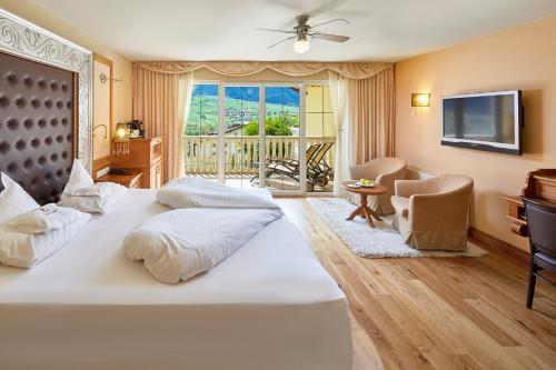 Imagen de la habitación del Hotel Preidlhof Luxury Dolce Vita Resort. Foto 20