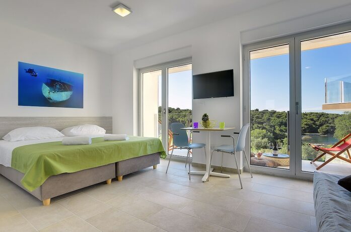 Imagen de la habitación del Hotel Premantura Resort - and Restaurant. Foto 16