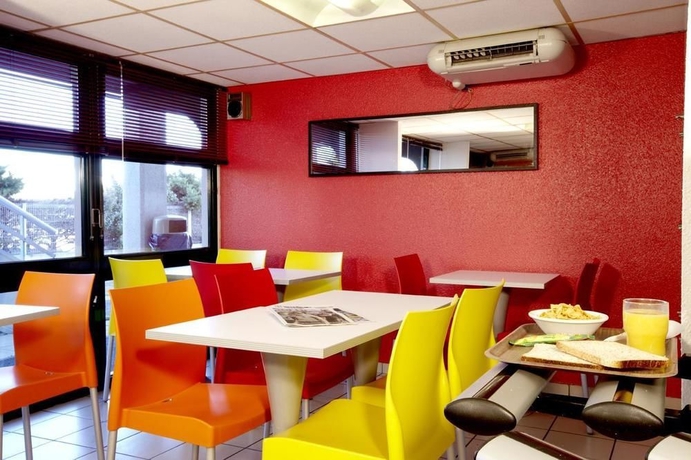 Imagen del bar/restaurante del Hotel Premi&egrave;re Classe A&eacute;roport Marseille. Foto 2