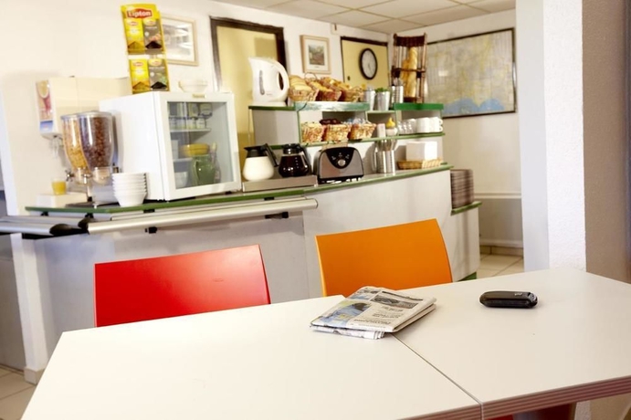 Imagen del bar/restaurante del Hotel Premi&egrave;re Classe A&eacute;roport Marseille. Foto 6
