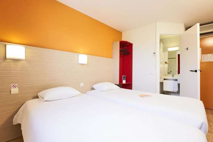 Imagen de la habitación del Hotel Premi&egrave;re Classe Bordeaux Nord - Lac. Foto 11