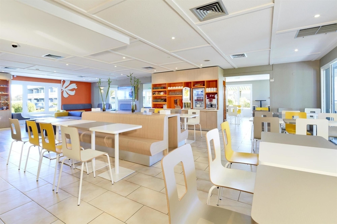 Imagen del bar/restaurante del Hotel Première Classe Poitiers Futuroscope – Chasseneuil. Foto 9