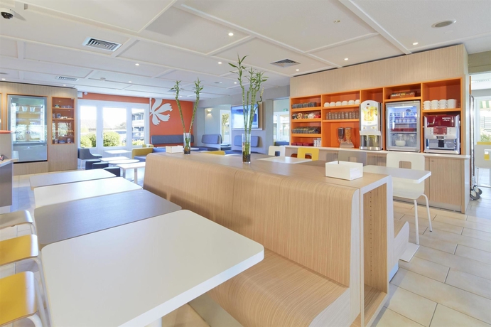 Imagen del bar/restaurante del Hotel Première Classe Poitiers Futuroscope – Chasseneuil. Foto 10