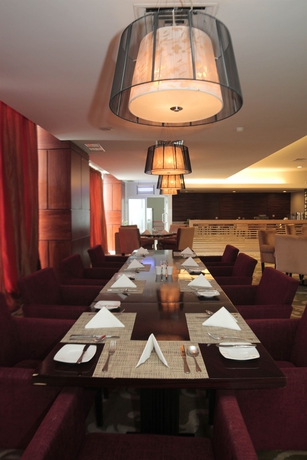 Imagen del bar/restaurante del Hotel Premier Basko Padang. Foto 3