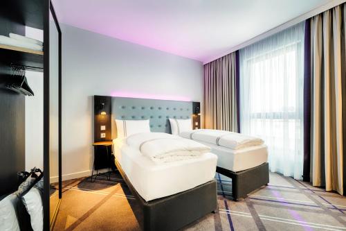 Imagen de la habitación del Hotel Premier Inn Berlin Airport. Foto 18