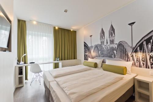 Imagen de la habitación del Hotel Premier Inn Freiburg City Nord. Foto 5