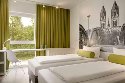 Imagen de la habitación del Hotel Premier Inn Freiburg City Nord. Foto 7