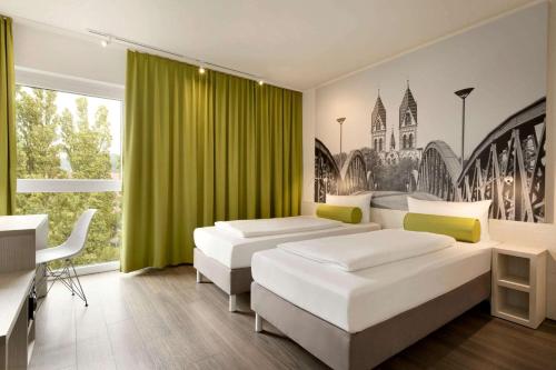 Imagen de la habitación del Hotel Premier Inn Freiburg City Nord. Foto 8