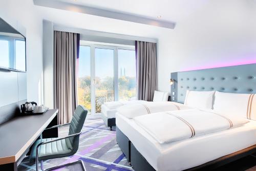 Imagen de la habitación del Hotel Premier Inn L&uuml;beck City Stadtgraben. Foto 17
