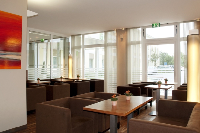 Imagen de los interiores del Hotel Premier Inn Munich Airport Ost. Foto 12