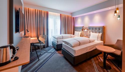 Imagen de la habitación del Hotel Premier Inn M&uuml;nchen Airport S&uuml;d. Foto 18