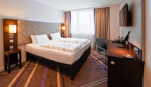 Imagen de la habitación del Hotel Premier Inn München City Zentrum. Foto 19