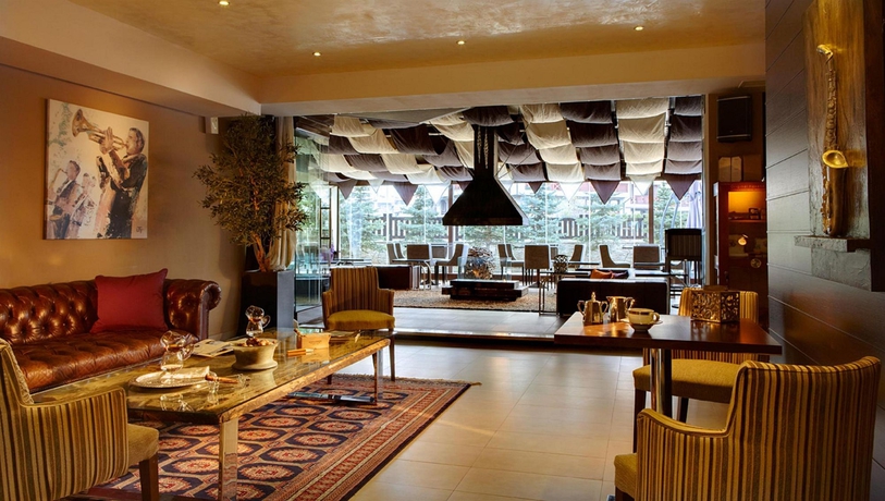 Imagen del bar/restaurante del Hotel Premier Luxury Mountain Resort. Foto 6