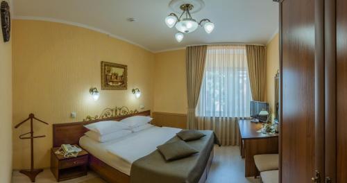 Imagen de la habitación del Hotel Premier Palazzo. Foto 8