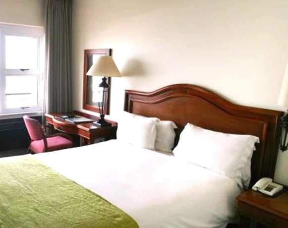 Imagen de la habitación del Hotel Premier Regent. Foto 7