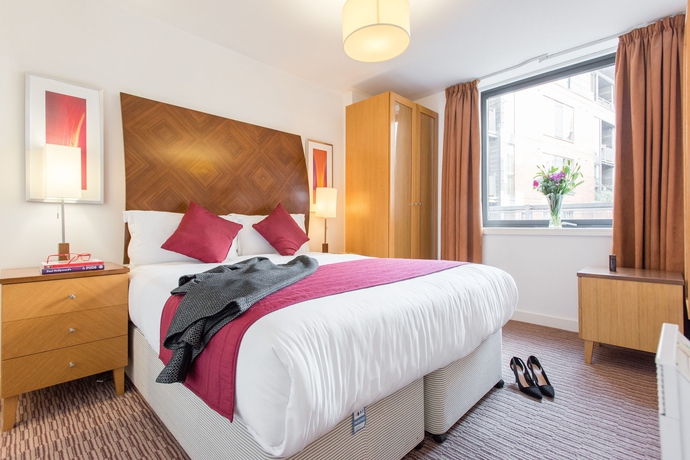 Imagen de la habitación del Hotel Premier Suites Manchester. Foto 4