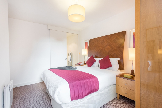 Imagen de la habitación del Hotel Premier Suites Manchester. Foto 13