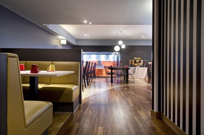 Imagen del bar/restaurante del Hotel Premier Suites Plus Antwerp. Foto 2