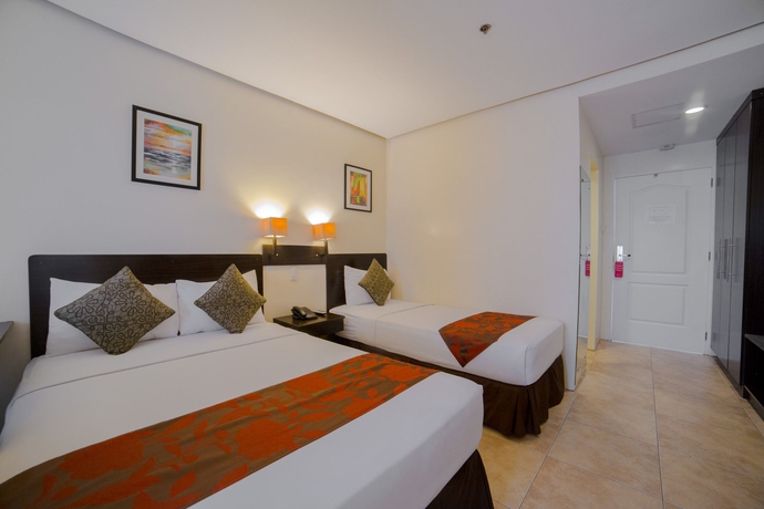 Imagen de la habitación del Hotel Premiere Citi Suites. Foto 2