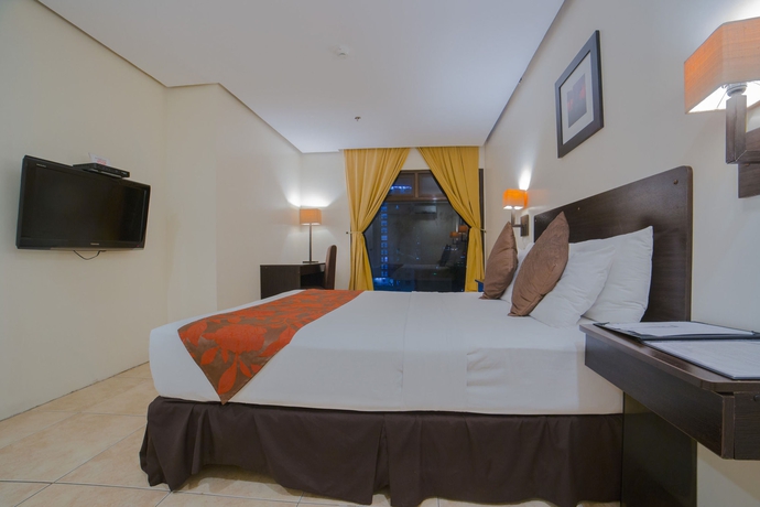 Imagen de la habitación del Hotel Premiere Citi Suites. Foto 3