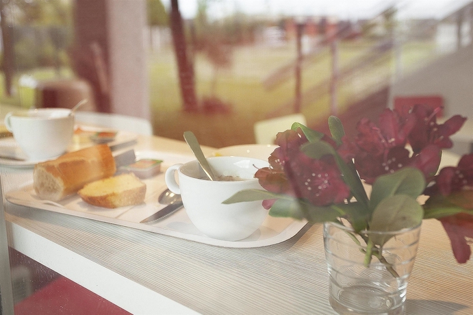 Imagen del bar/restaurante del Hotel Premiere Classe Grenoble Nord - Moirans. Foto 4