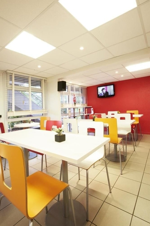 Imagen del bar/restaurante del Hotel Premiere Classe Lyon Est - Bron Eurexpo. Foto 13