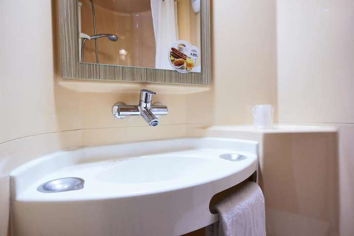 Imagen de la habitación del Hotel Premiere Classe Saint Brice Sous For&ecirc;t. Foto 10