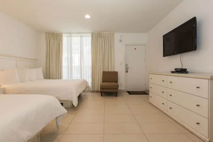 Imagen de la habitación del Hotel Premiere Hotel. Foto 2