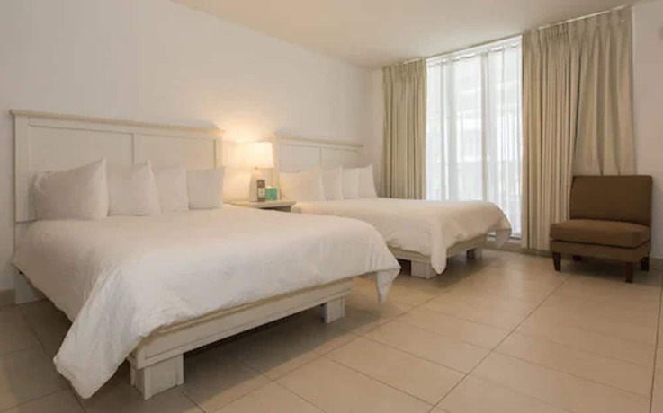 Imagen de la habitación del Hotel Premiere Hotel. Foto 4