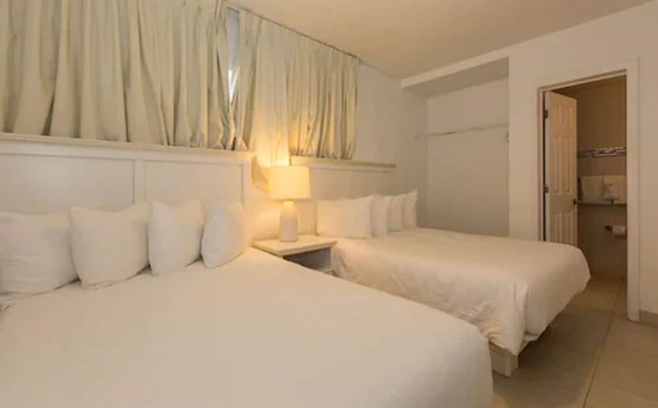 Imagen de la habitación del Hotel Premiere Hotel. Foto 5