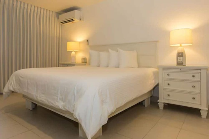 Imagen de la habitación del Hotel Premiere Hotel. Foto 8
