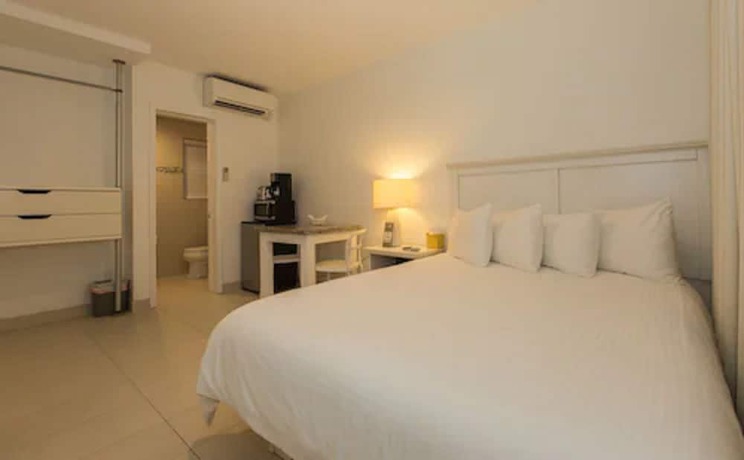 Imagen de la habitación del Hotel Premiere Hotel. Foto 9