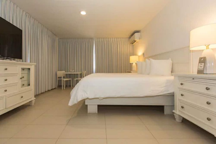 Imagen de la habitación del Hotel Premiere Hotel. Foto 13