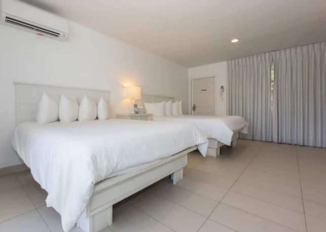 Imagen de la habitación del Hotel Premiere Hotel. Foto 14