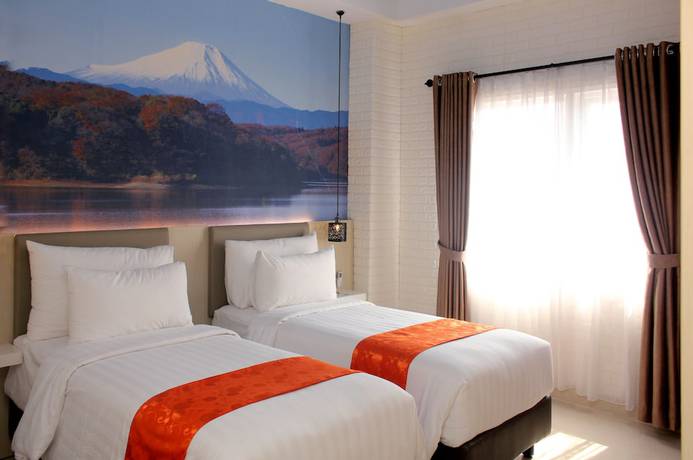 Imagen de la habitación del Hotel Premiere Tegal. Foto 10