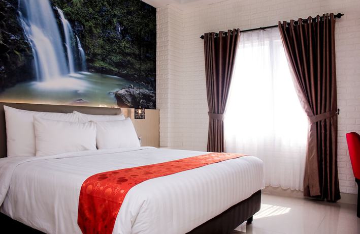 Imagen de la habitación del Hotel Premiere Tegal. Foto 13