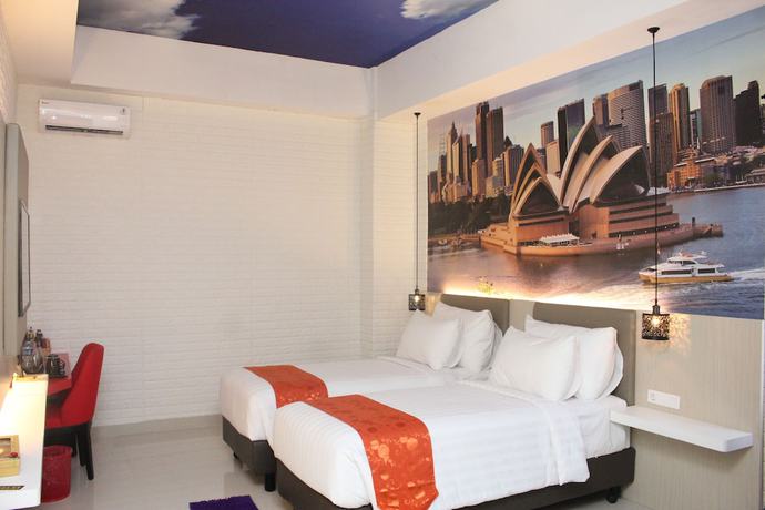 Imagen de la habitación del Hotel Premiere Tegal. Foto 16
