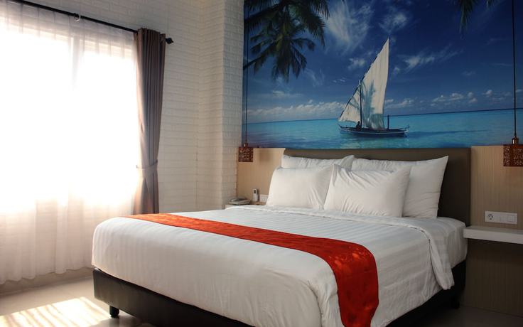 Imagen de la habitación del Hotel Premiere Tegal. Foto 18
